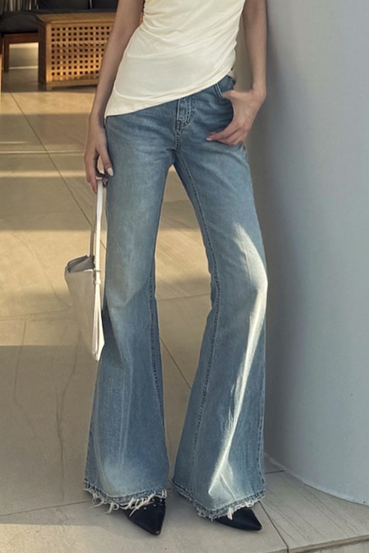 時髦抽鬚造型修身微喇叭牛仔長褲