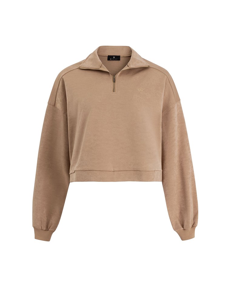 supple shiny turtleneck top