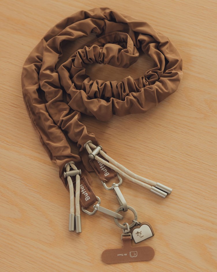 奶油捲捲手機背帶