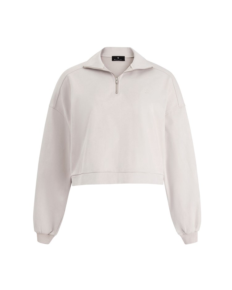 supple shiny turtleneck top