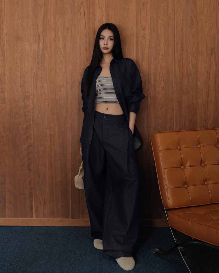 斜打摺彎刀牛仔褲